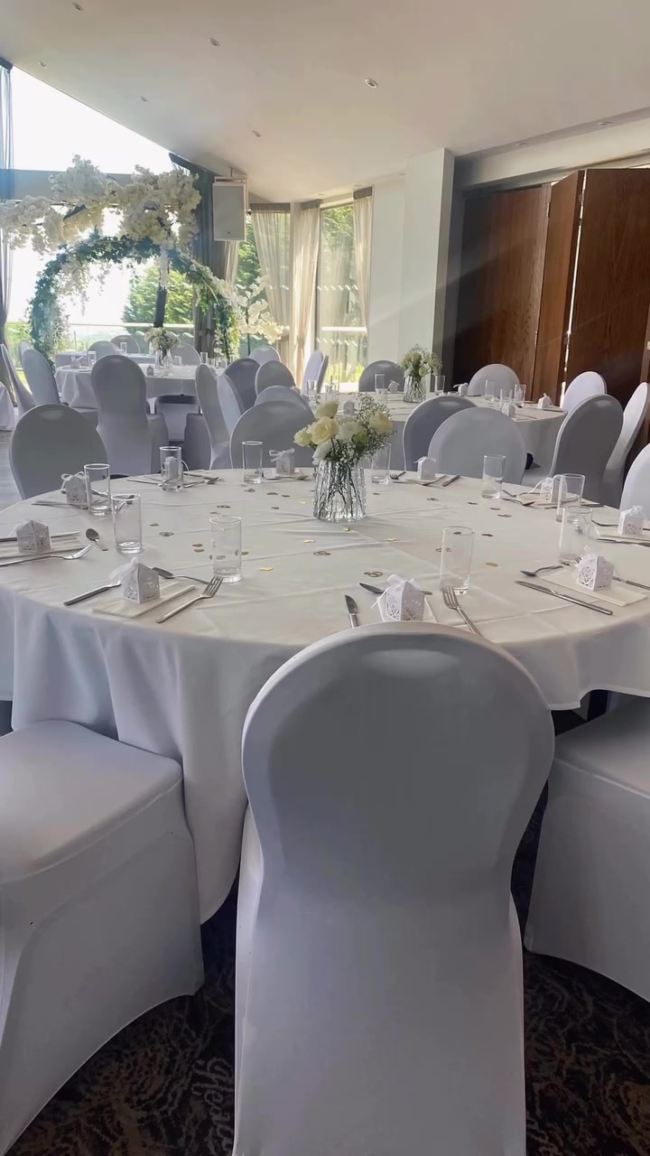 A real Nikah setup at Headley: floral table settings, desserts and views across the terrace.